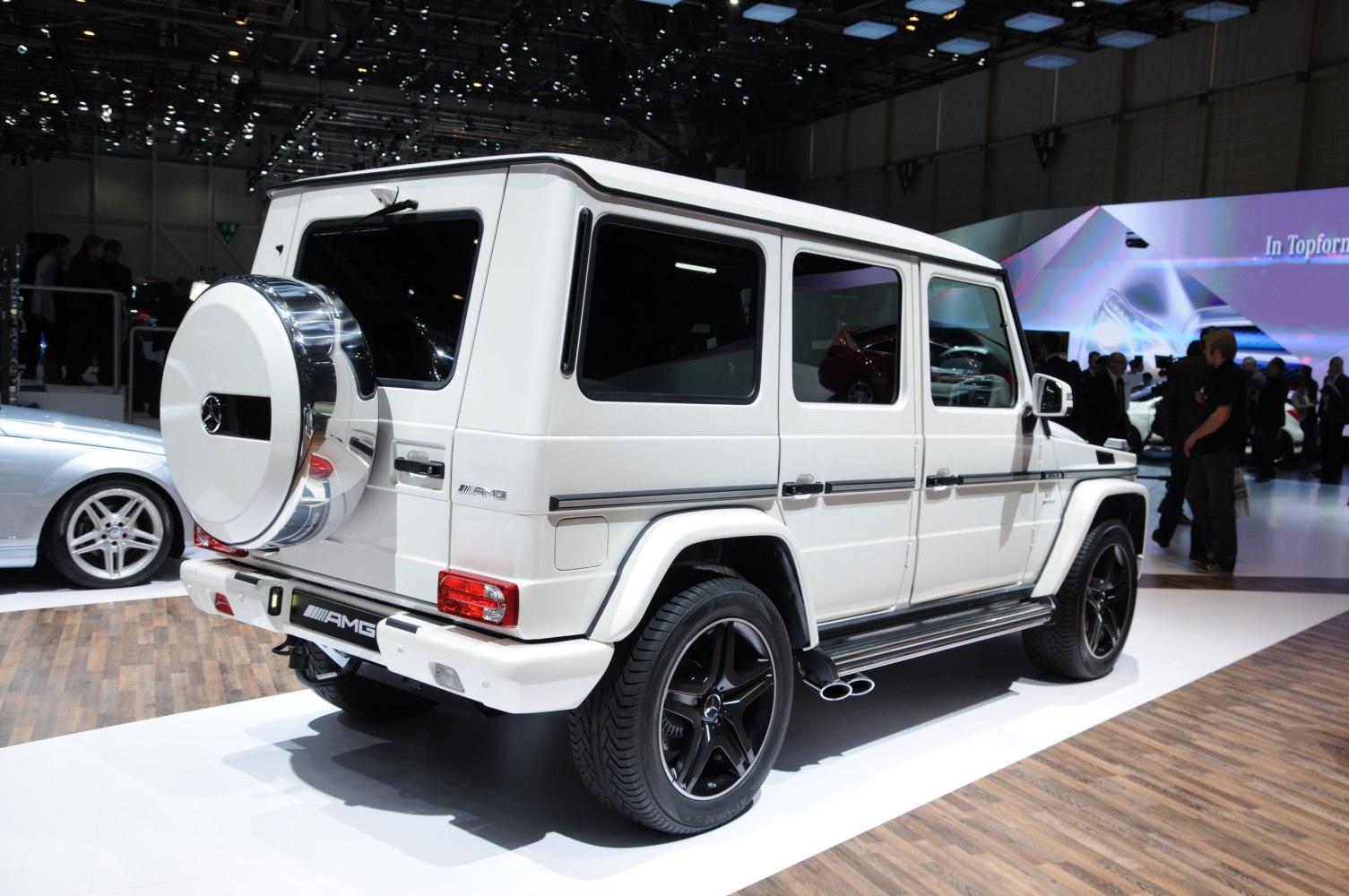 Rear and side profile with spare wheel cover and black wheels