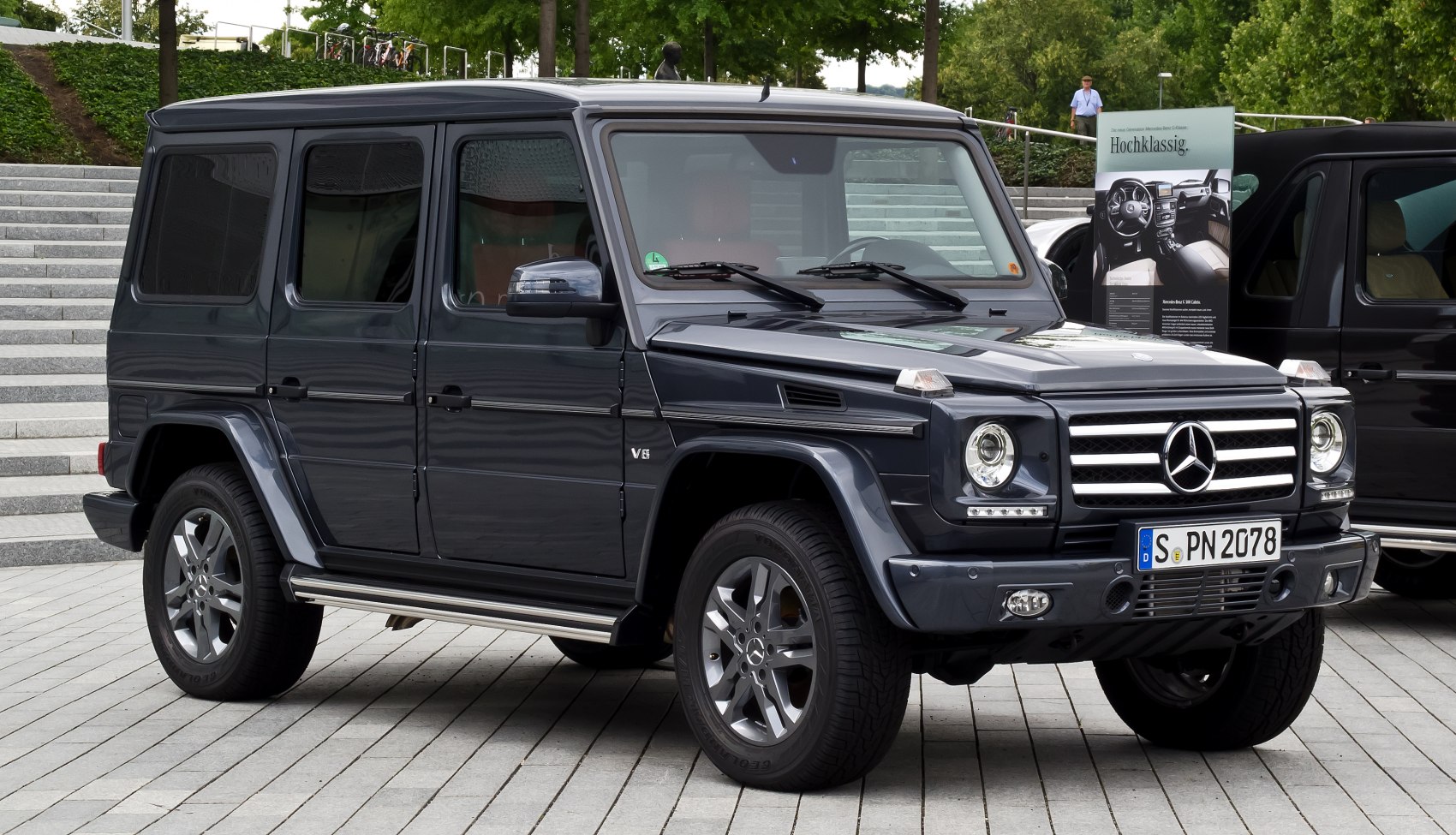 Boxy SUV with V8 badge front and side view