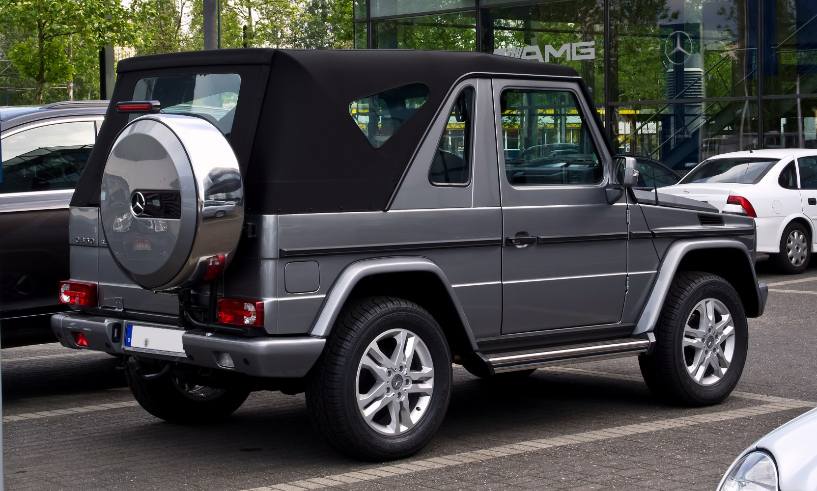 Soft top convertible SUV rear with spare tire cover