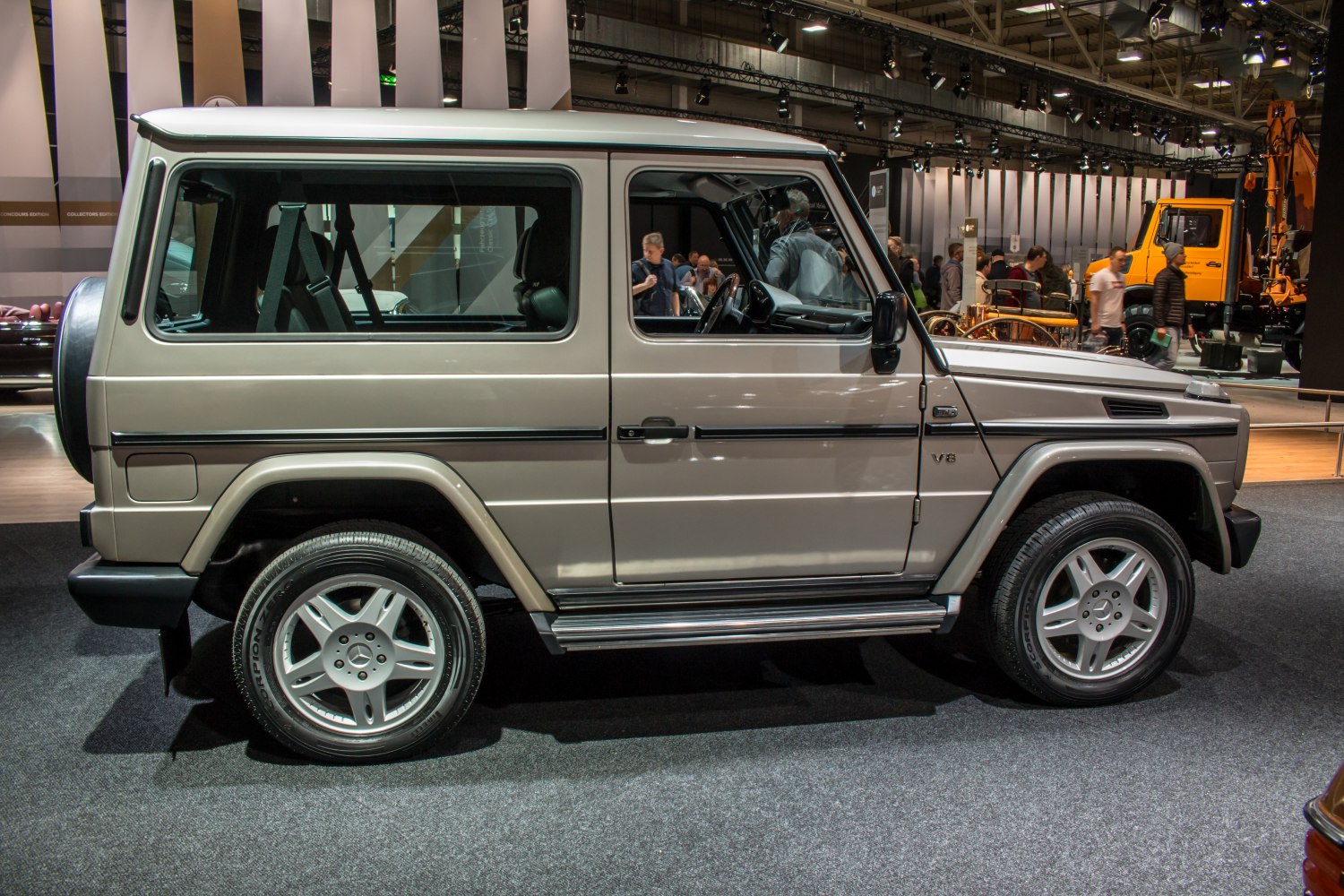 Two-door SUV side profile showcasing boxy shape and V8 badge