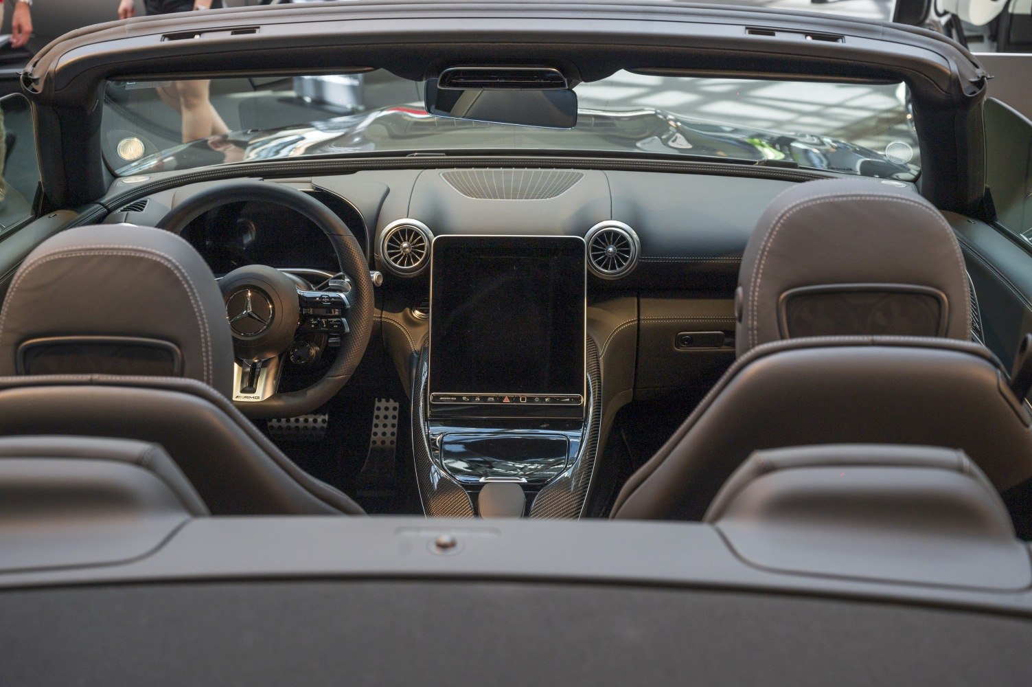 Digital center console and aerodynamic two-seat convertible interior