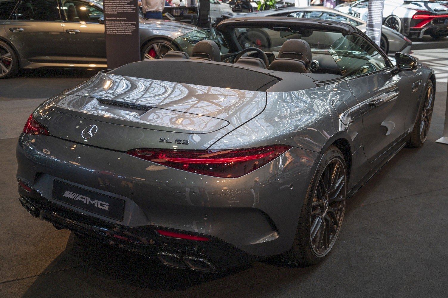 Rear view of convertible with sleek LED taillights and quad exhausts