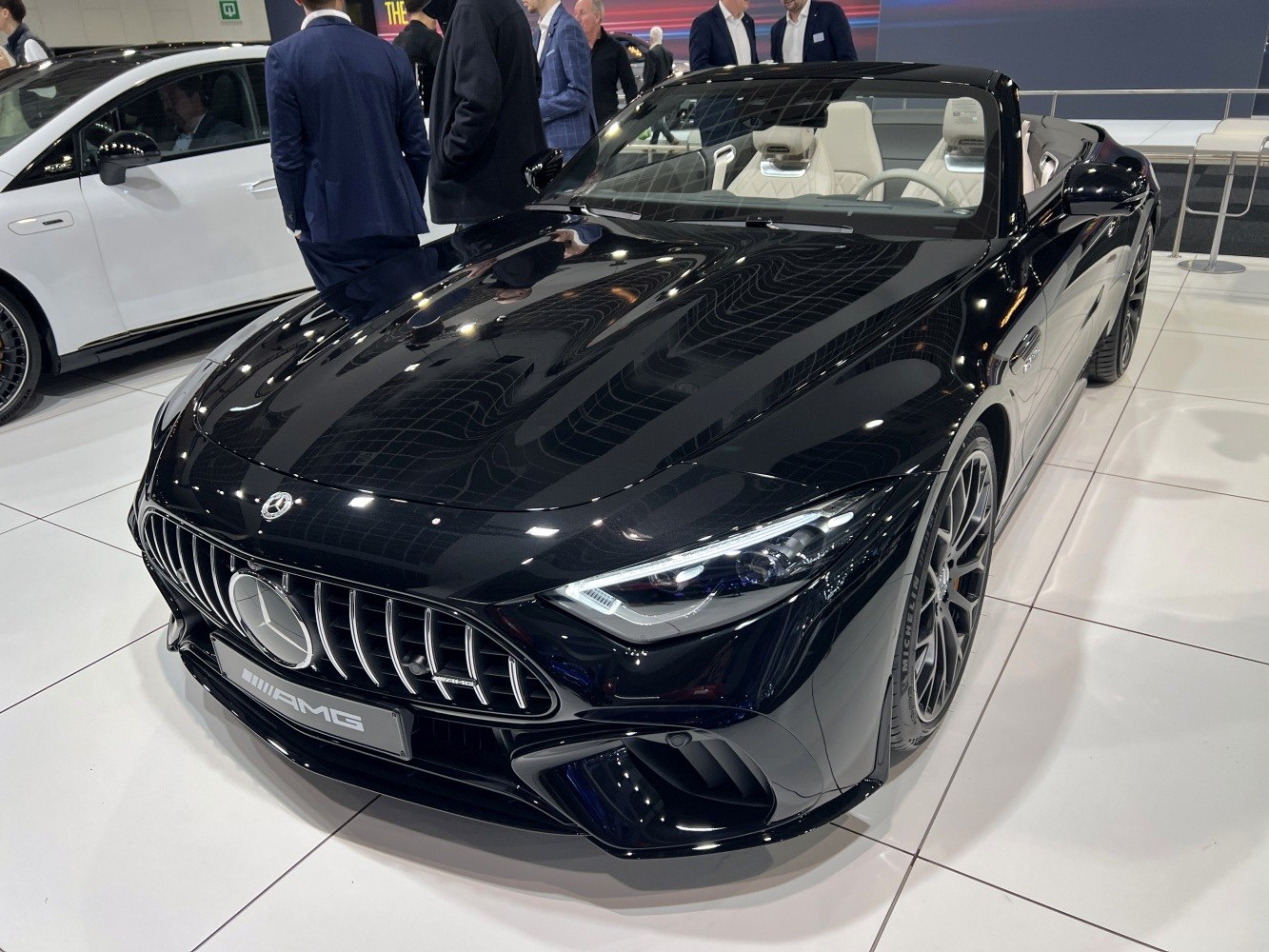 Front view of black convertible with AMG grille and LED headlights
