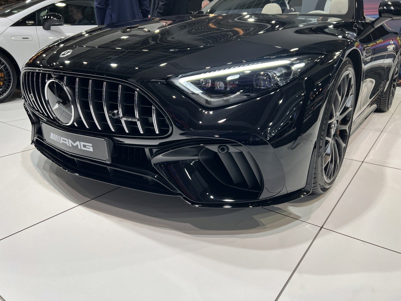 Close-up of AMG front grille and LED headlight of luxury sports car