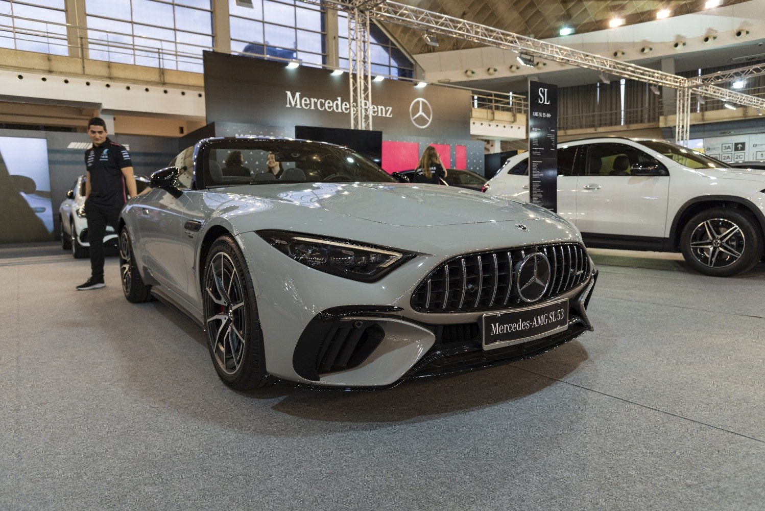 Aggressive front grille and sleek headlights of a luxury sports car