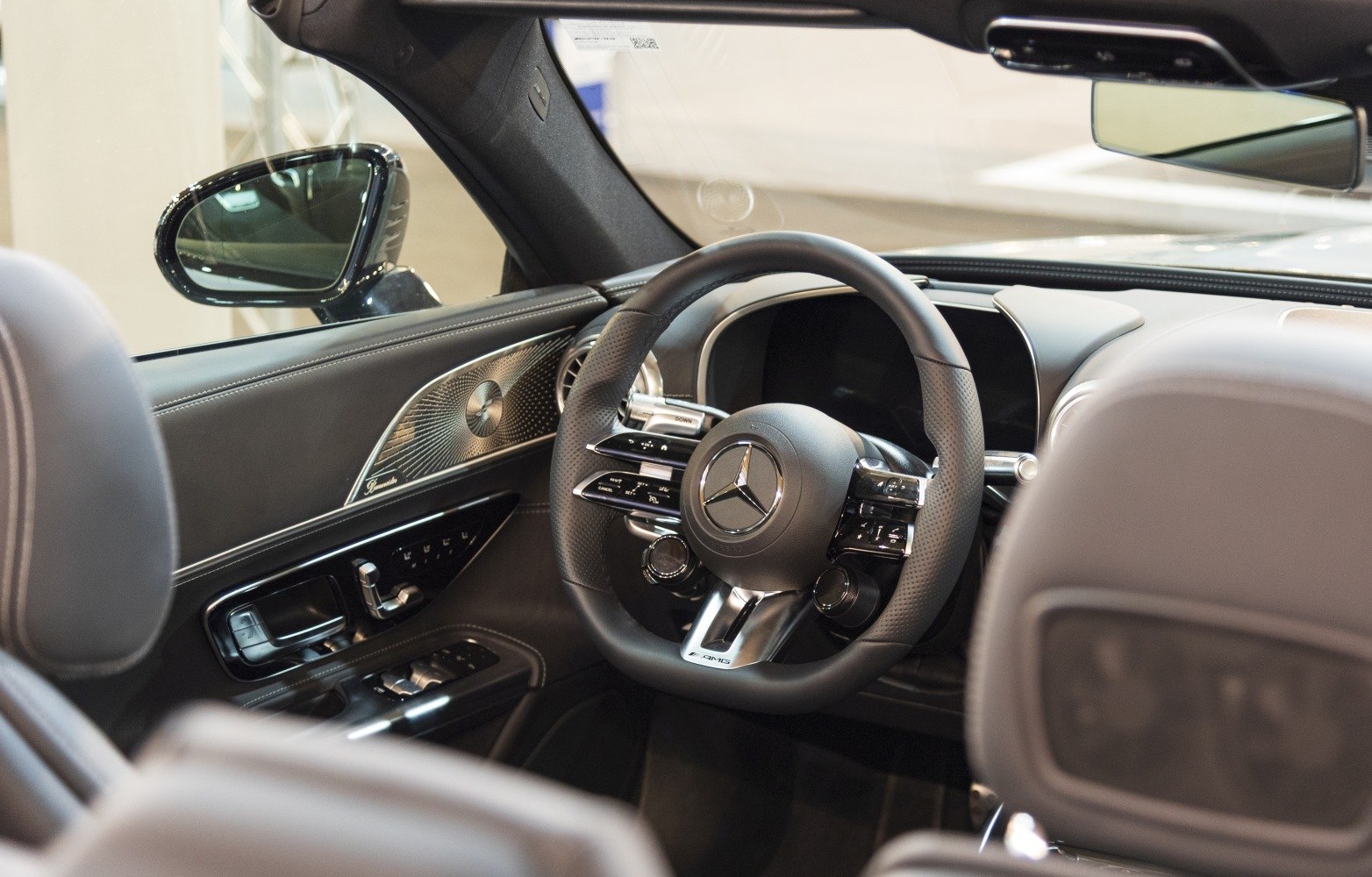 AMG steering wheel and premium interior with digital dashboard