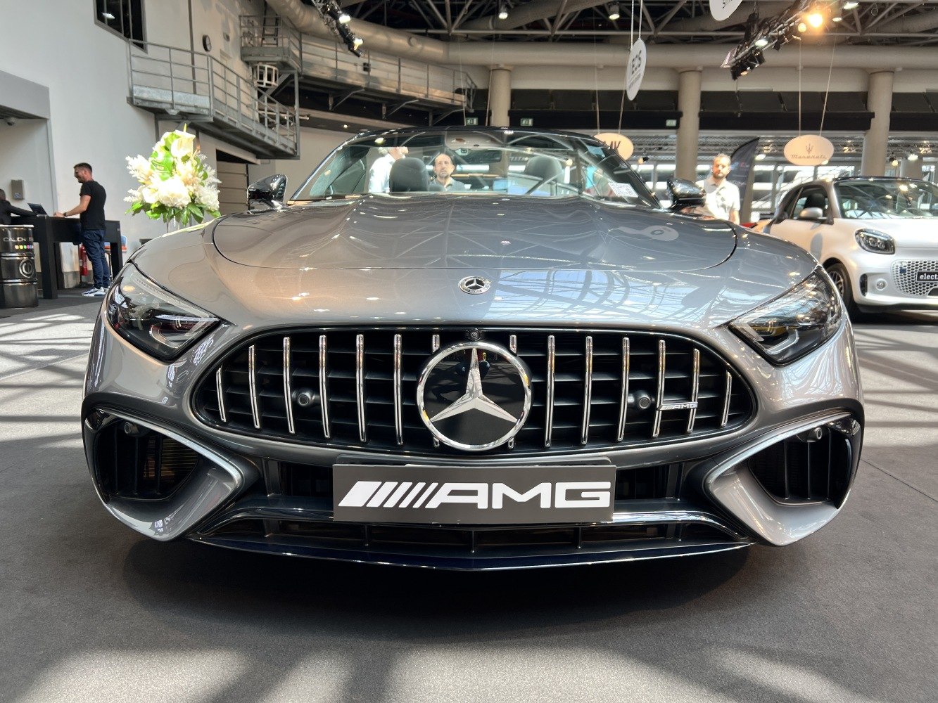 Close-up of AMG grille and sleek headlights at front