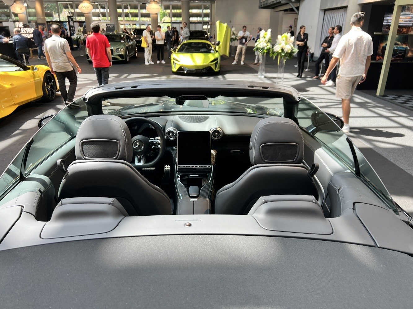 Convertible interior with central touchscreen and two seats