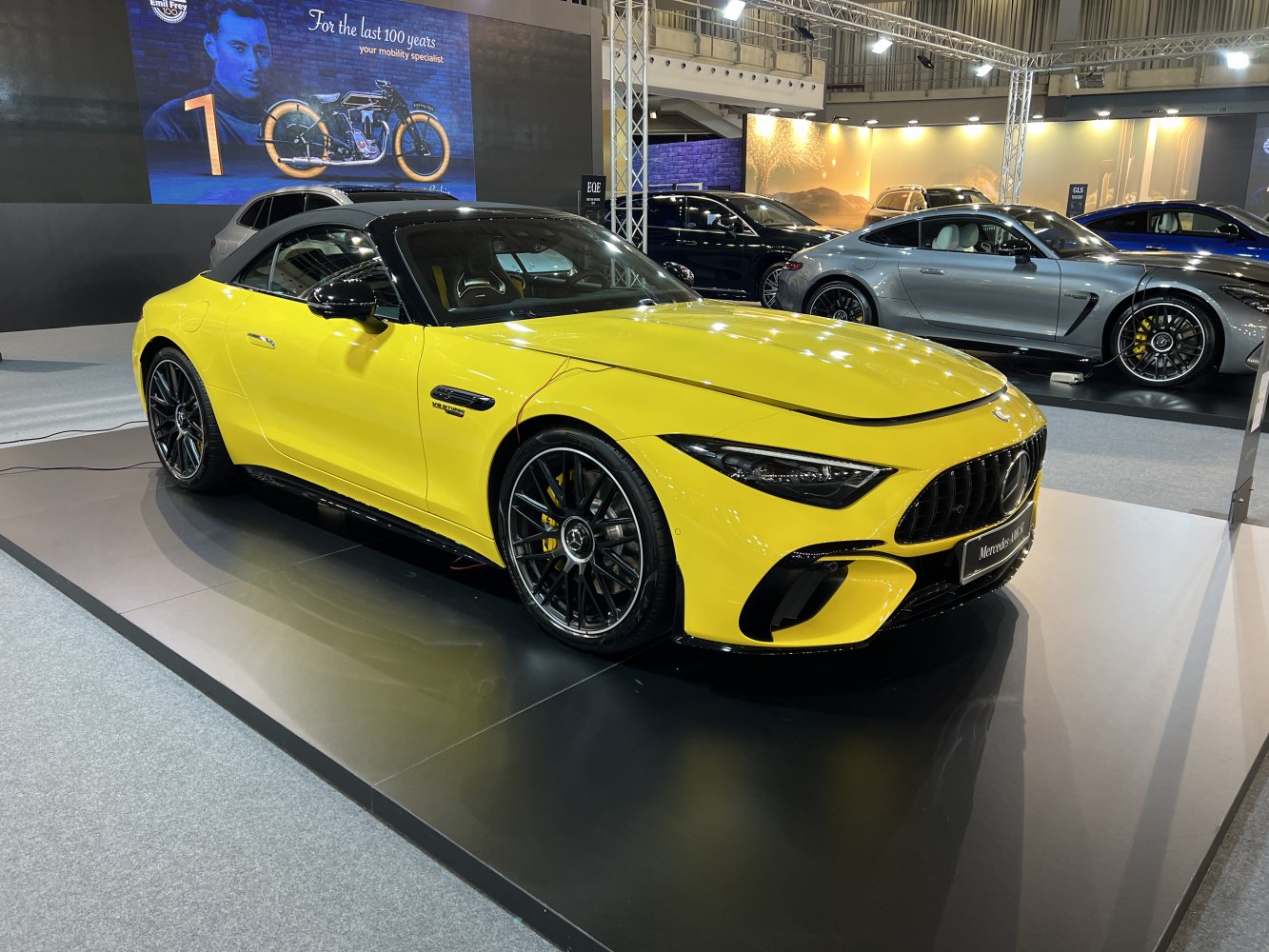 Yellow convertible with AMG front grille and alloy wheels