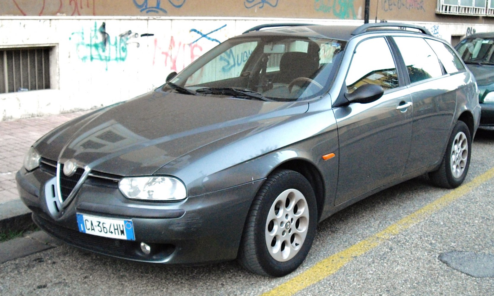 Front side view of a station wagon with alloy wheels