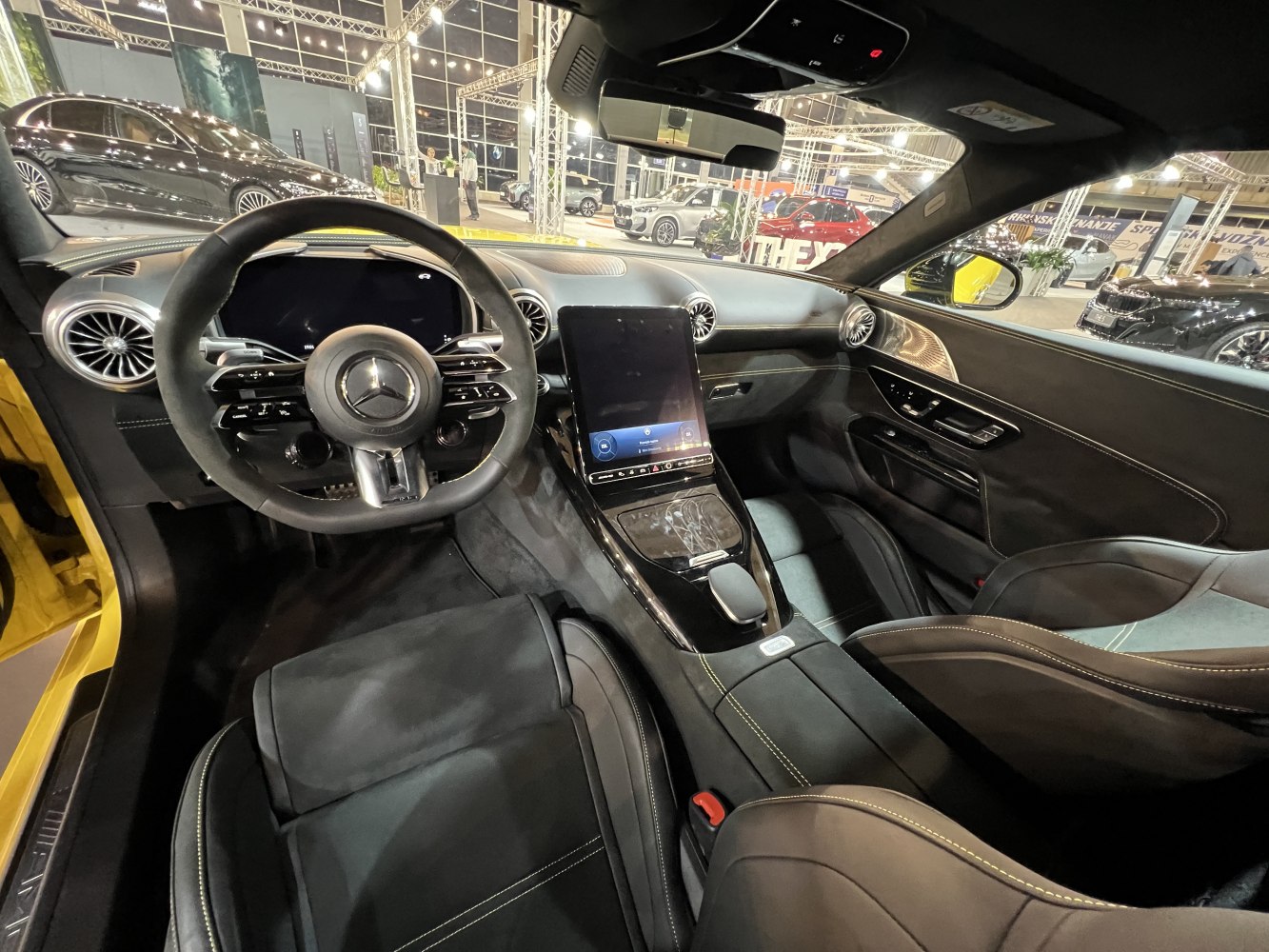 Luxurious black interior with digital dashboard and central touchscreen display