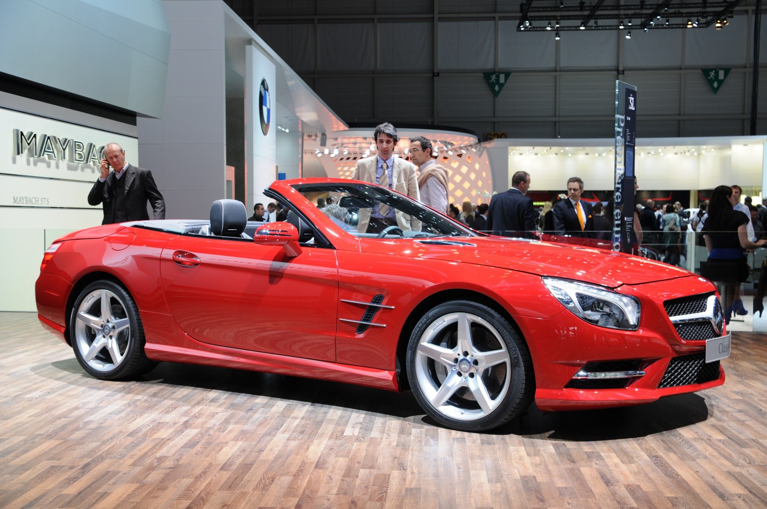 Red convertible roadster with sporty alloy wheels and aerodynamic styling