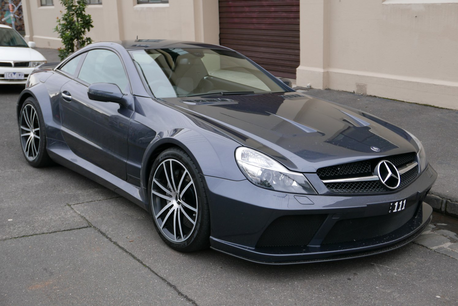 aerodynamic bodywork and large multi-spoke alloy wheels