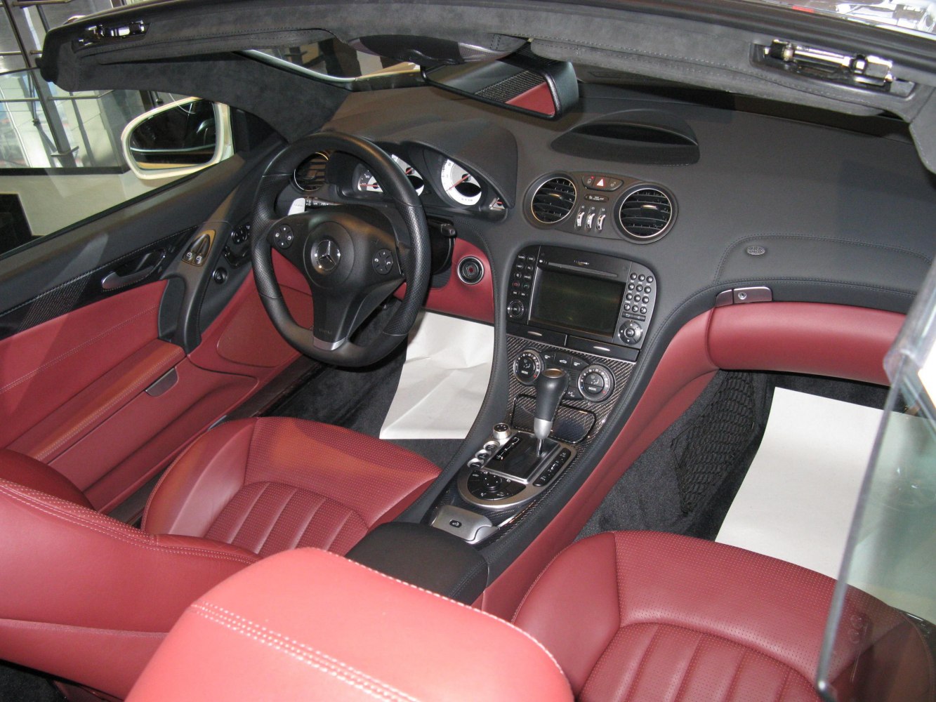 Luxury red leather interior with modern dashboard and center console design