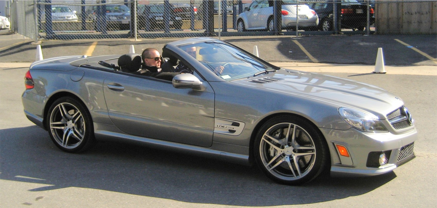 Convertible side view with distinctive 5-spoke alloy wheels