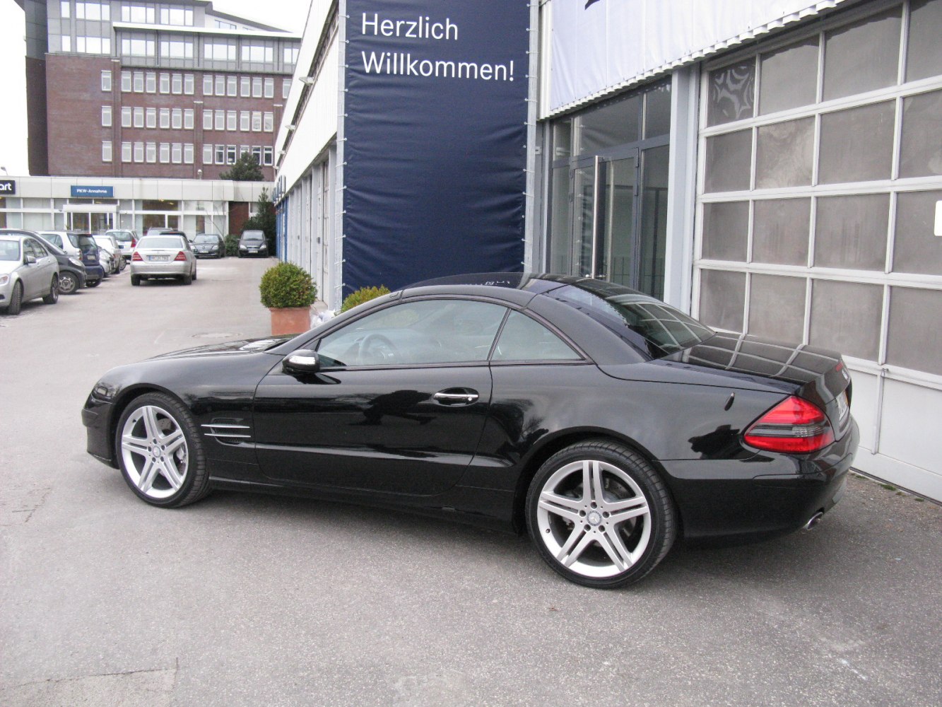 Black coupe with alloy wheels and sleek side profile