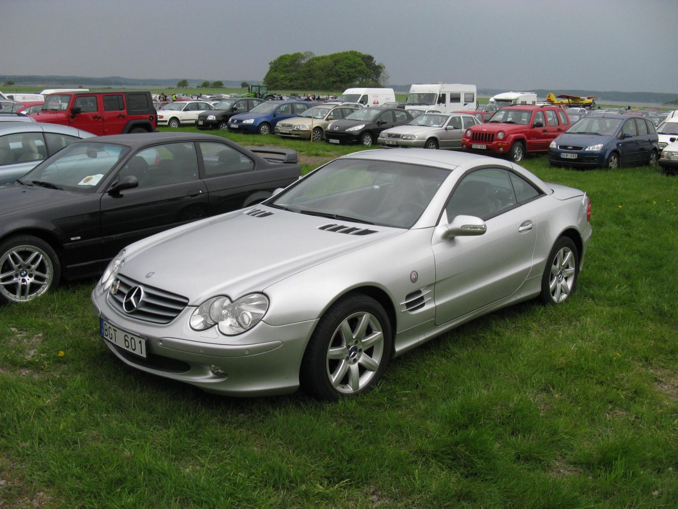 Silver coupe with front vents and alloy wheels