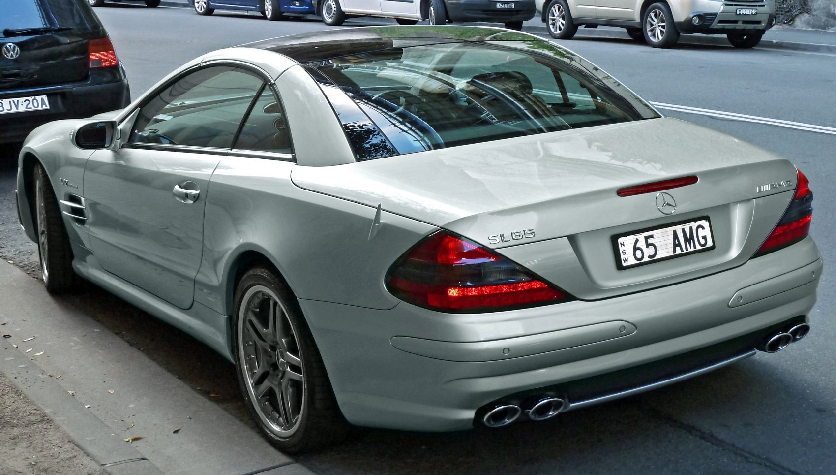 Rear view of coupe with AMG quad exhaust and V12 badging