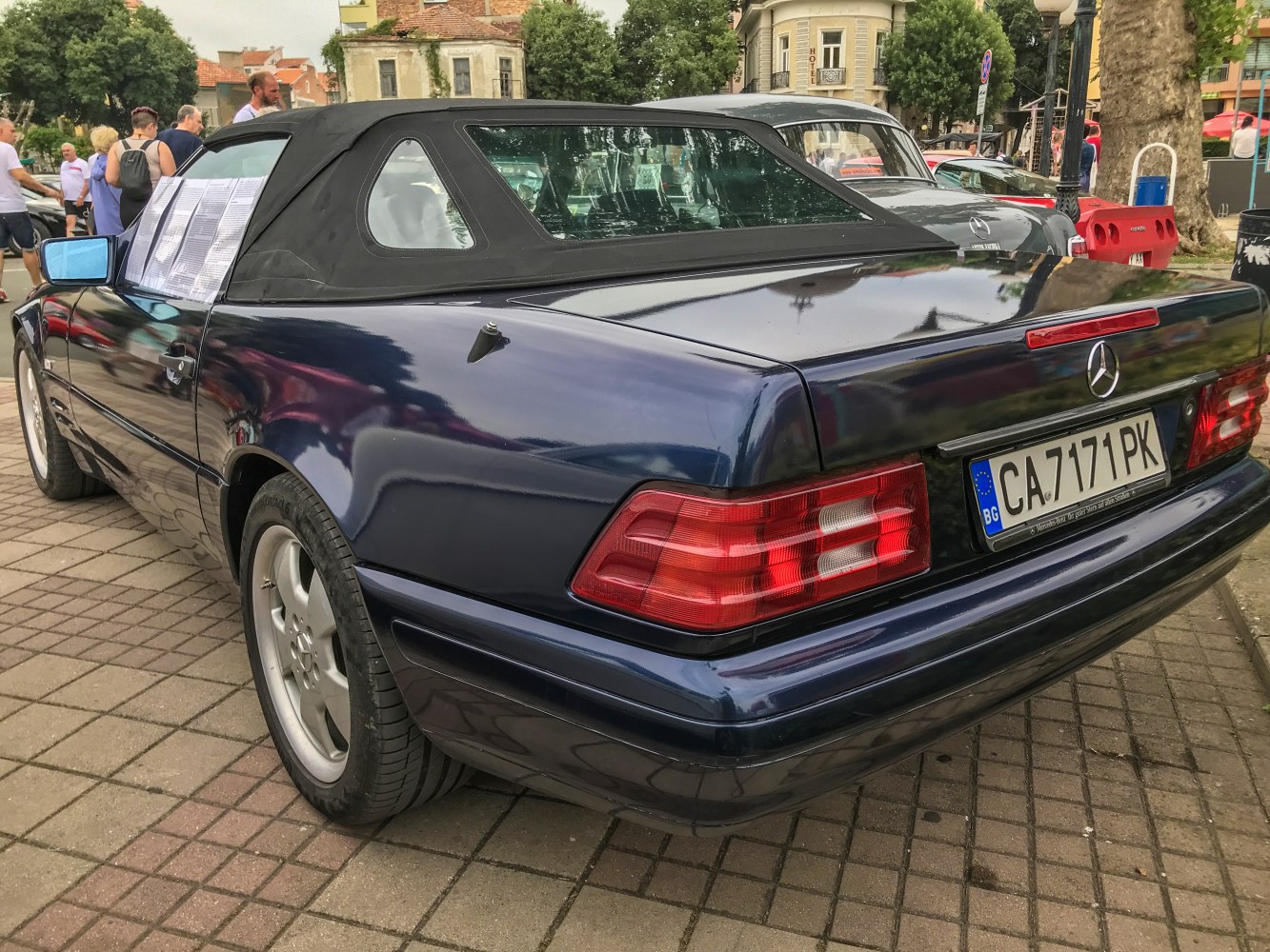 Rear view of a classic convertible soft top with distinctive tail lights