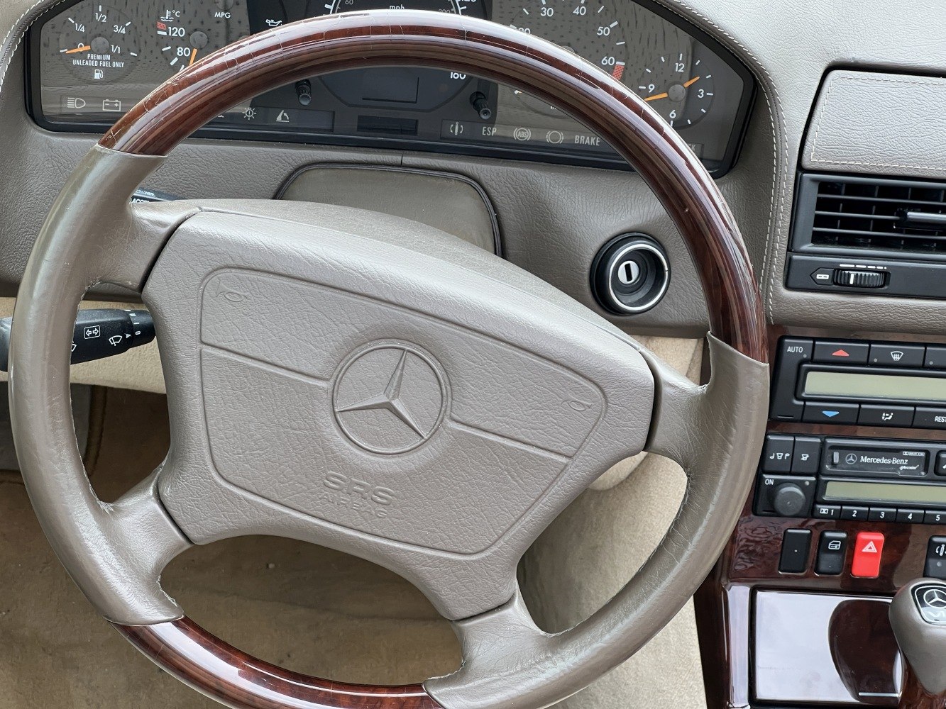 Wood-trimmed steering wheel and dashboard instrumentation