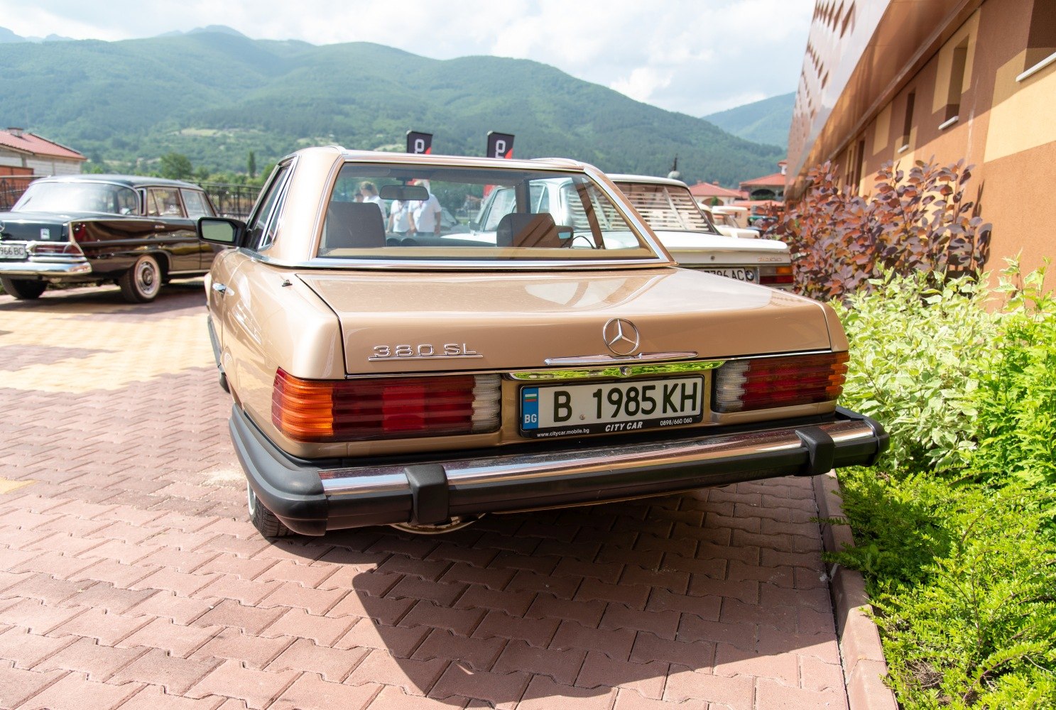 Rear view of vintage 380 SL with distinctive tail lights and chrome bumper