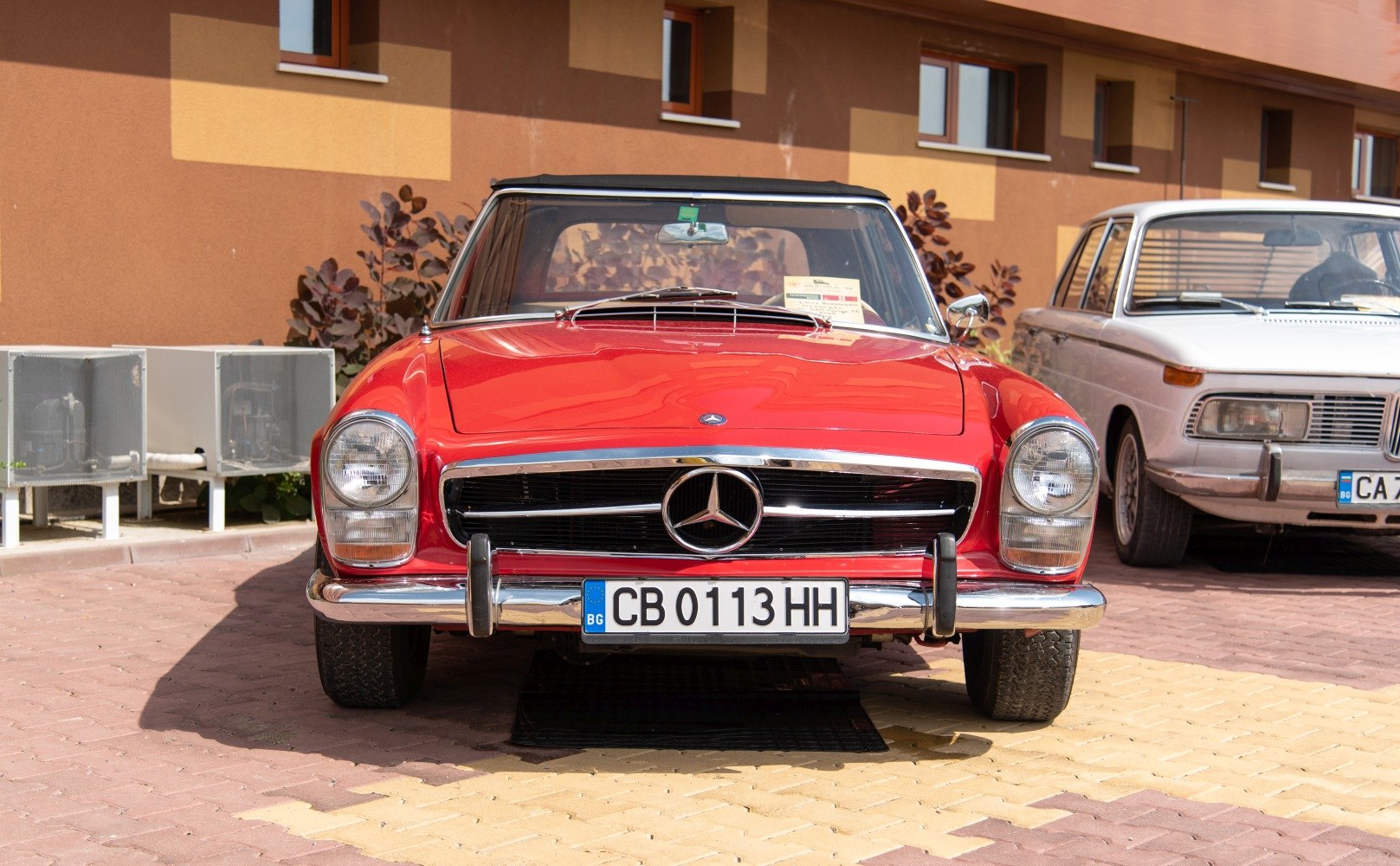 Classic front view with iconic grille and round headlights