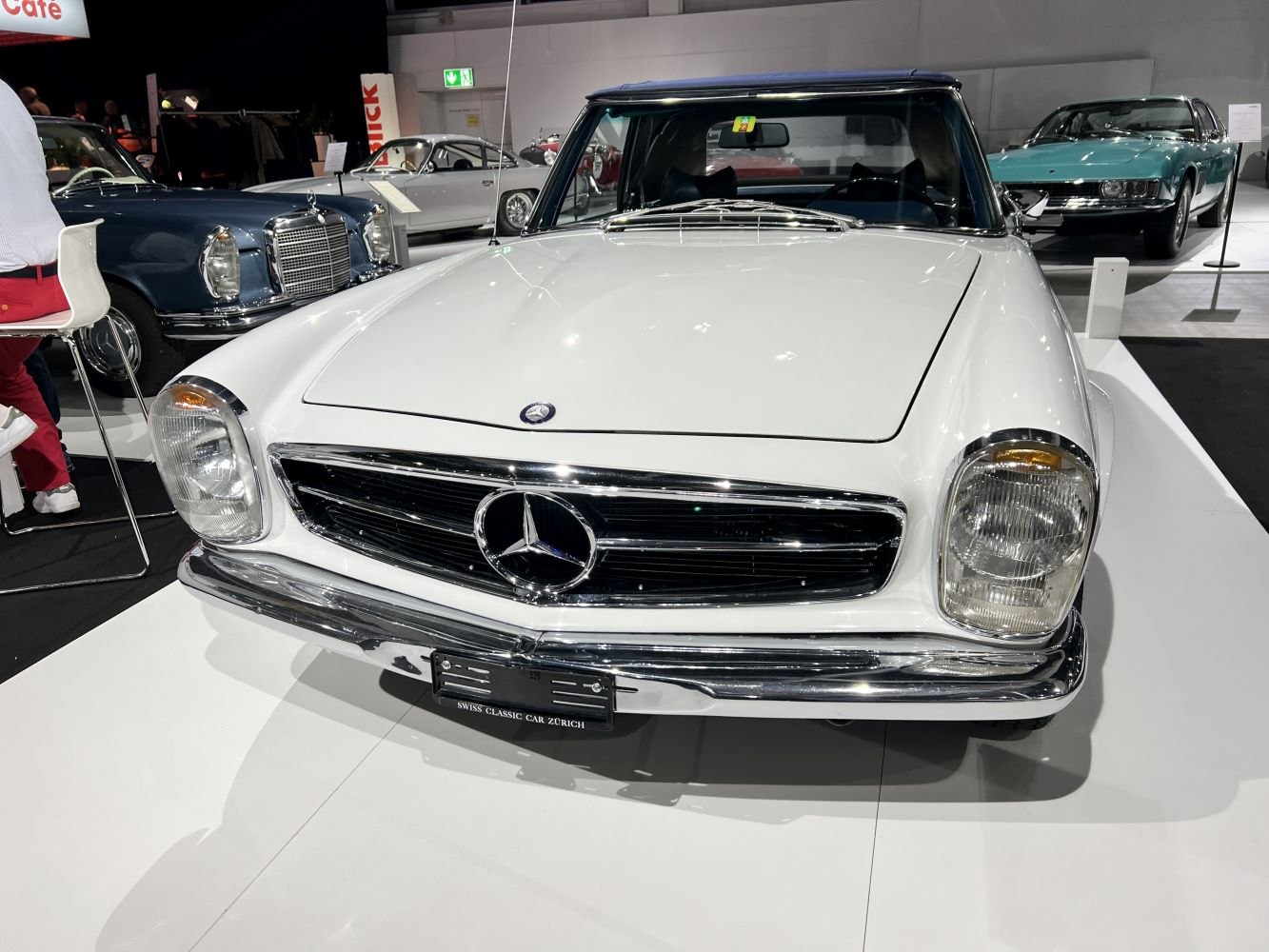 Classic car front view with iconic grille and round headlights