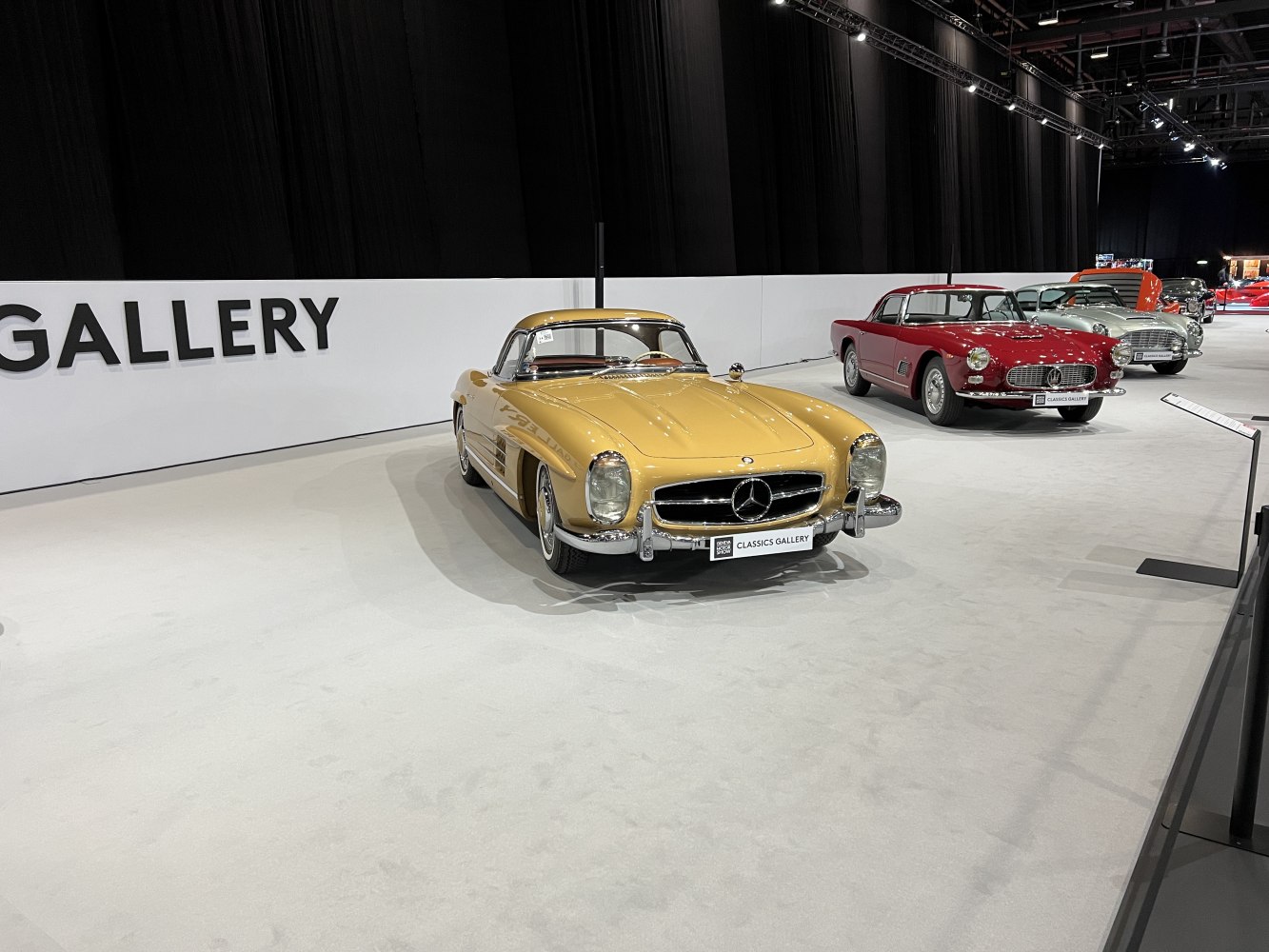 Sleek vintage hardtop roadster with iconic front grille and chrome accents