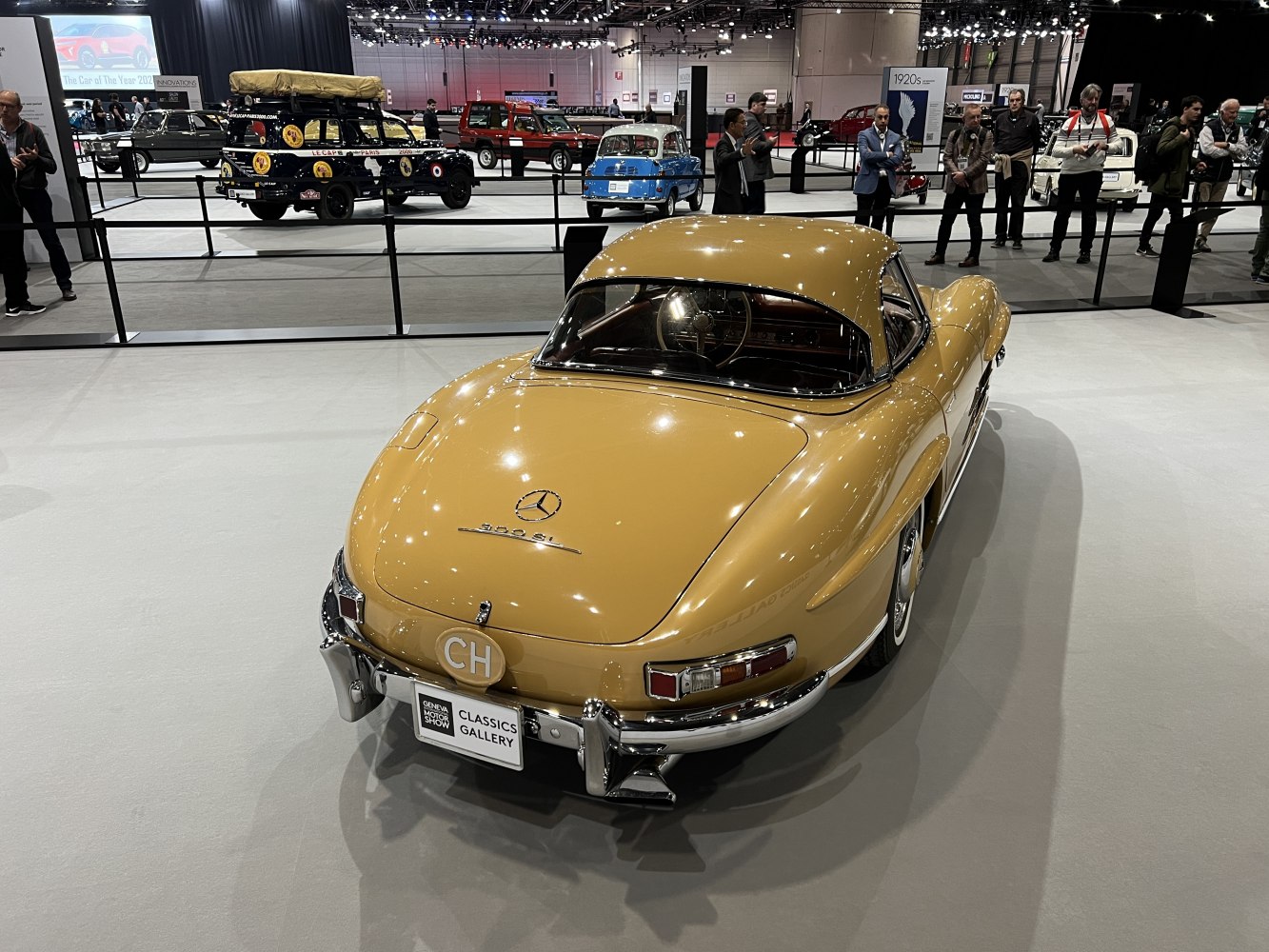 Vintage classic roadster rear view with hardtop and chrome bumpers