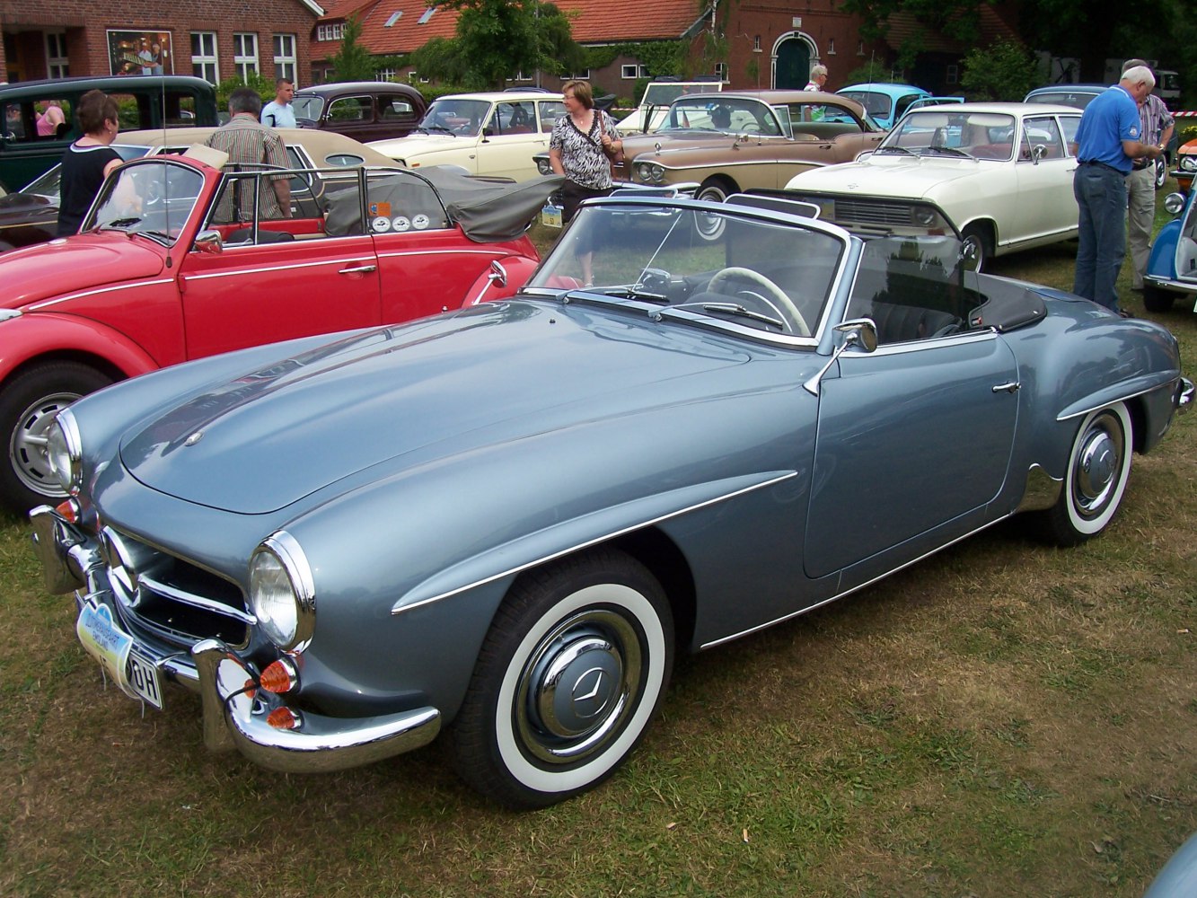 Convertible with chrome trim and whitewall tires