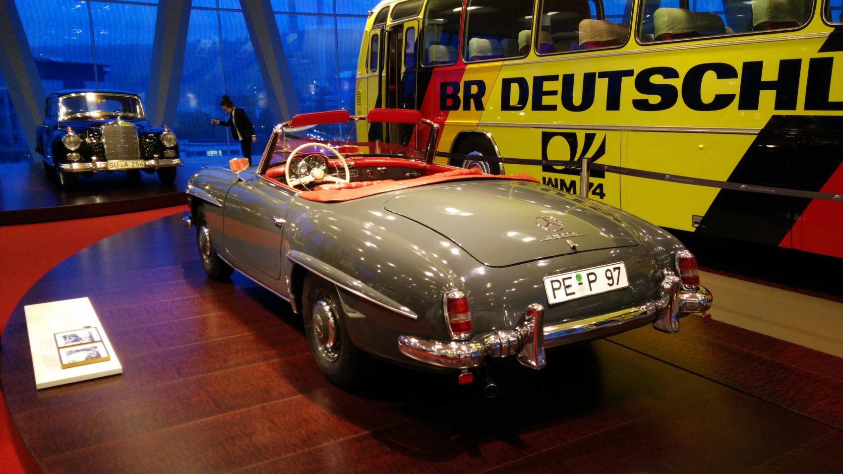 Classic convertible with chrome bumper and red interior