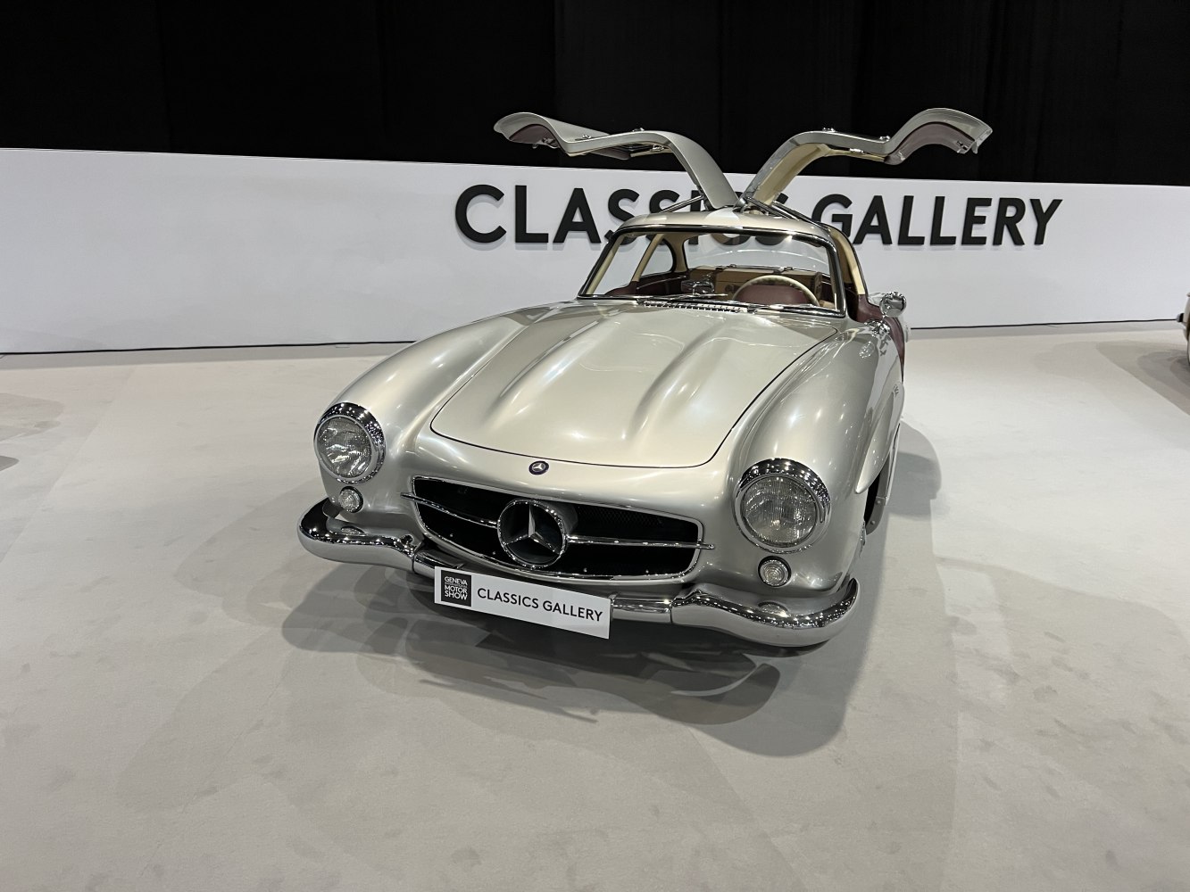 Classic coupe featuring signature gullwing doors in silver finish