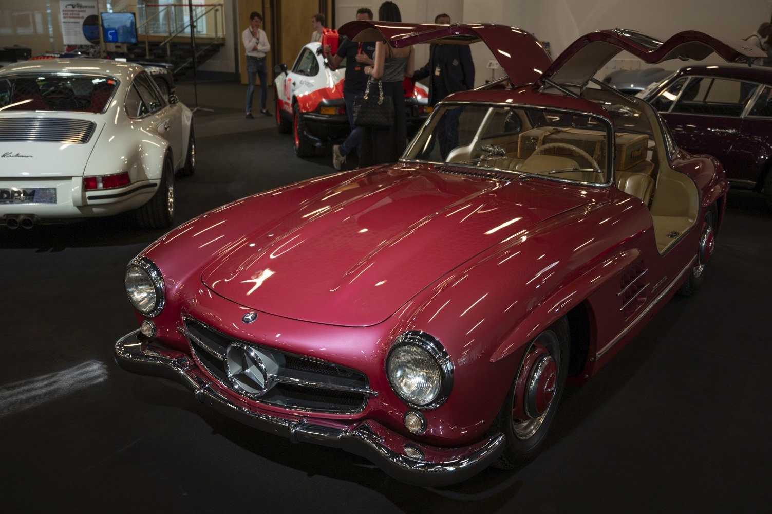 Vintage coupe with distinctive gullwing doors and classic 1950s styling