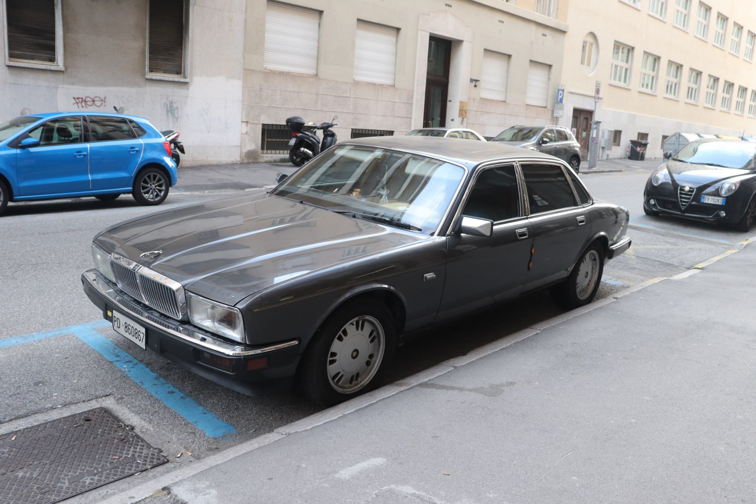 Classic luxury sedan with chrome grille and sleek body design