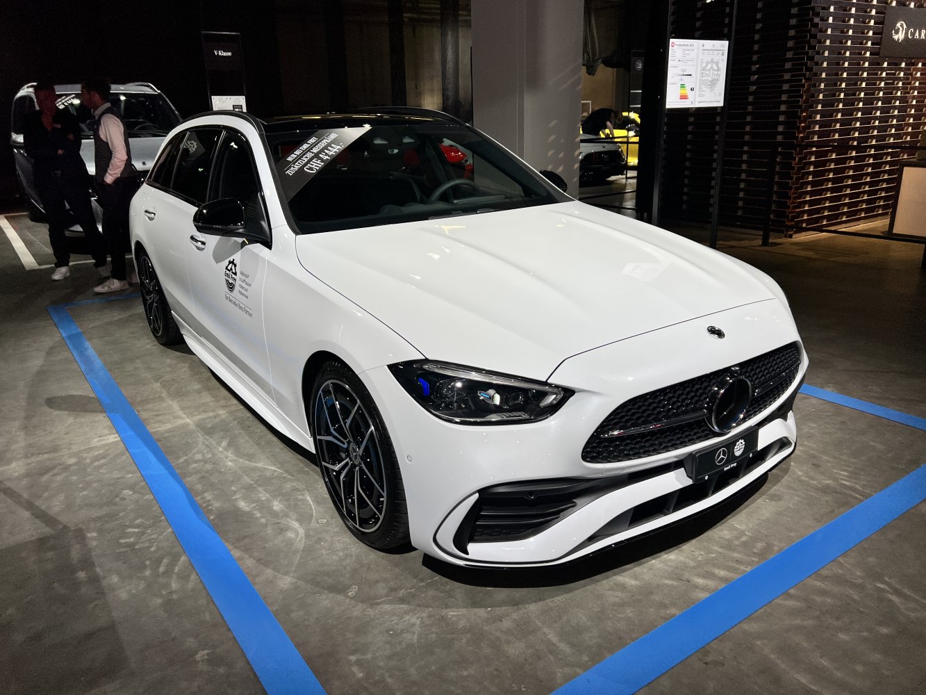 Front angle view with LED headlights and alloy wheels