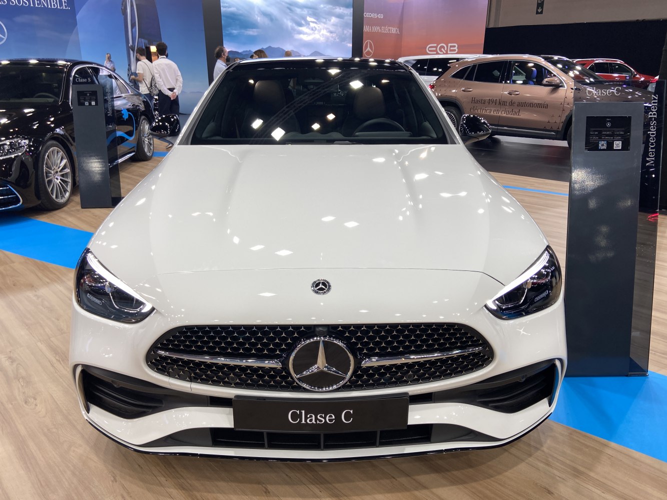 Luxury sedan front with star emblem grille and aerodynamic headlights