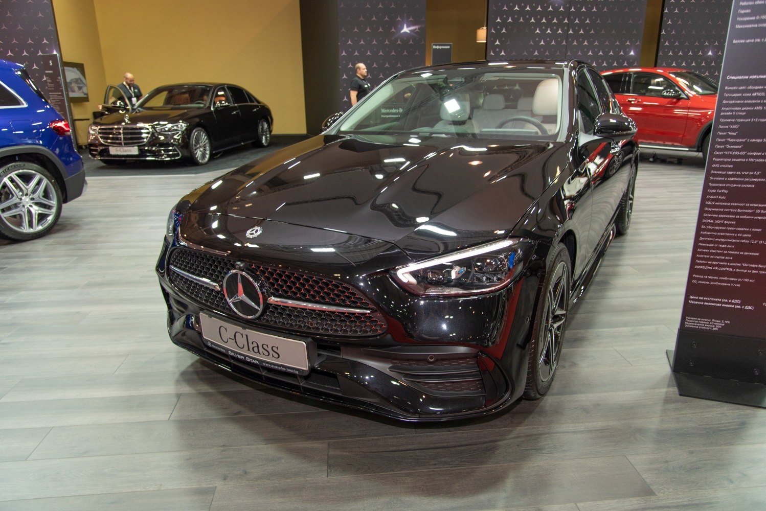 Luxury sedan front with LED headlights and grille