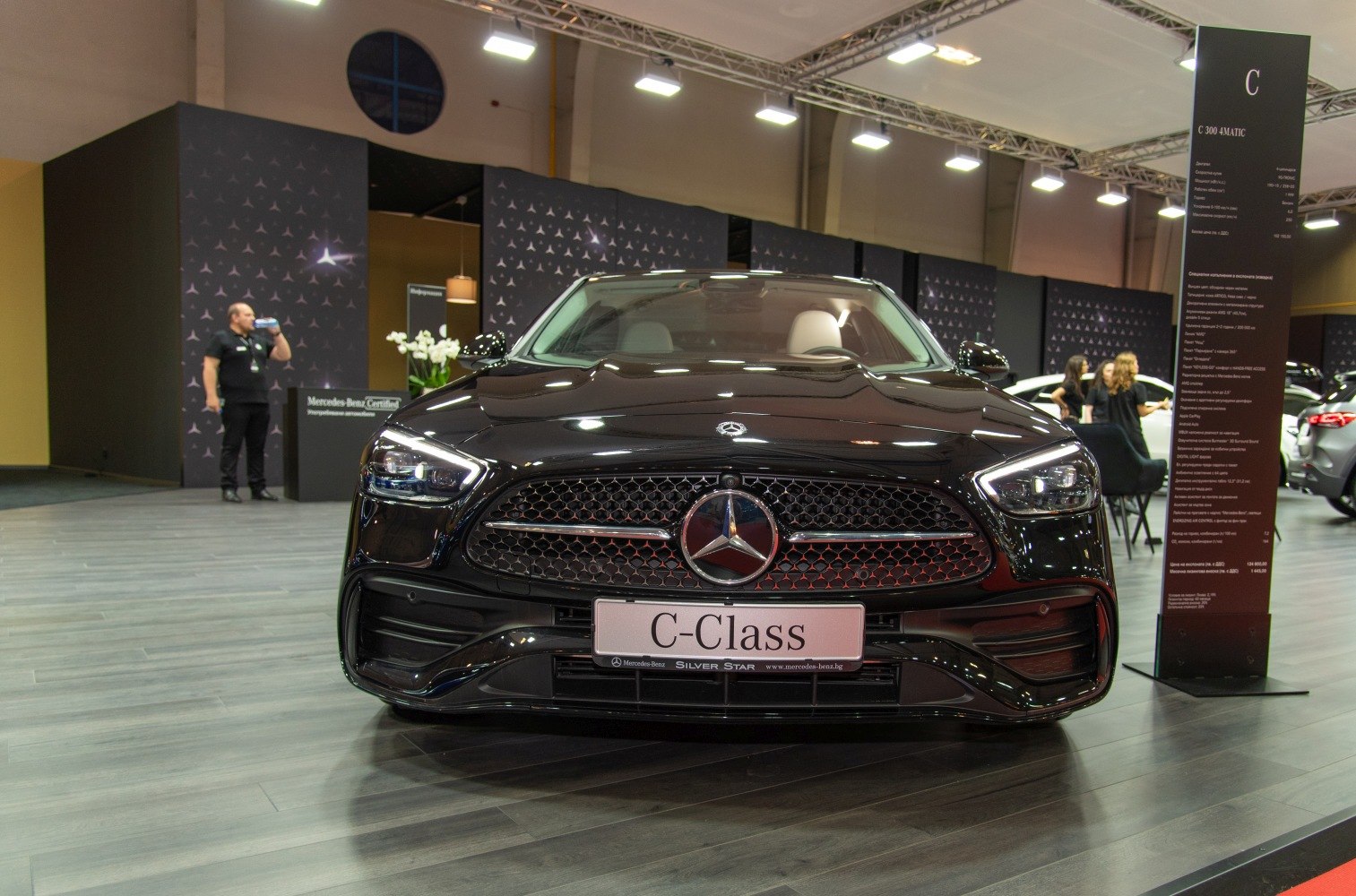 Front view with grille and LED headlights