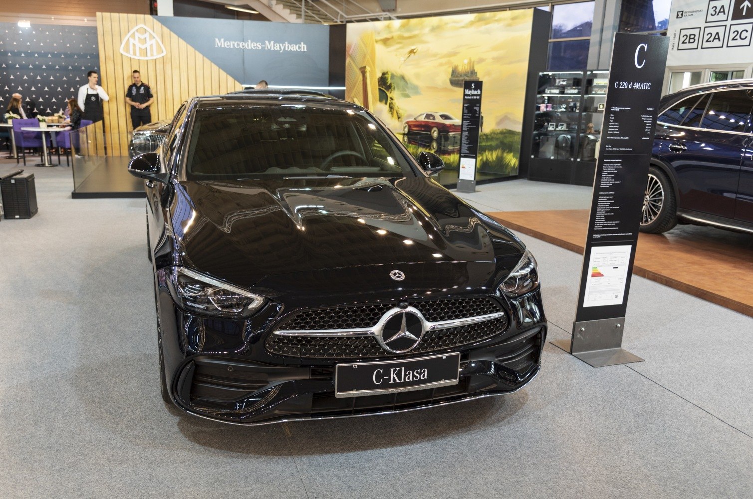 Front view with grille, headlights, and sporty bumper in black finish
