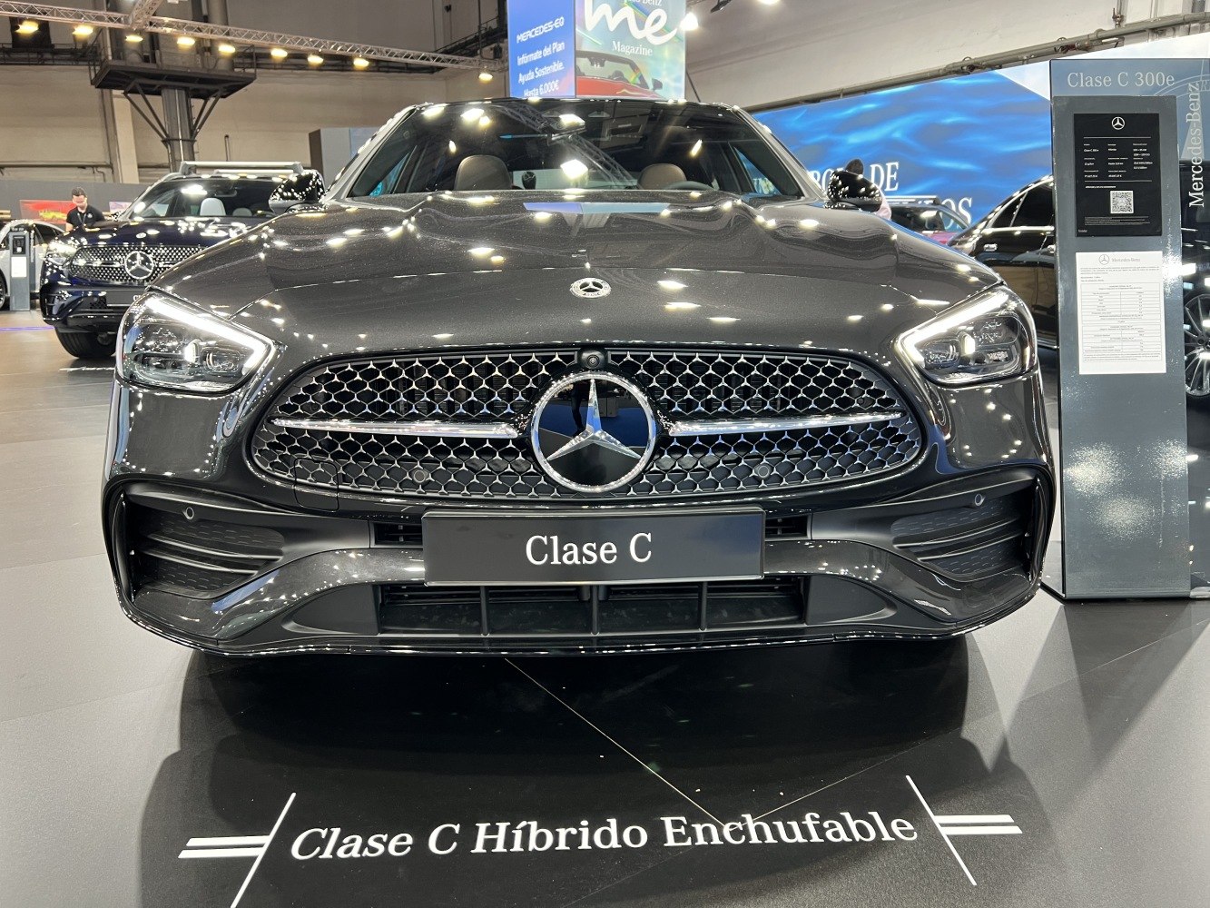 Front view showing LED headlights and diamond grille with Mercedes emblem.