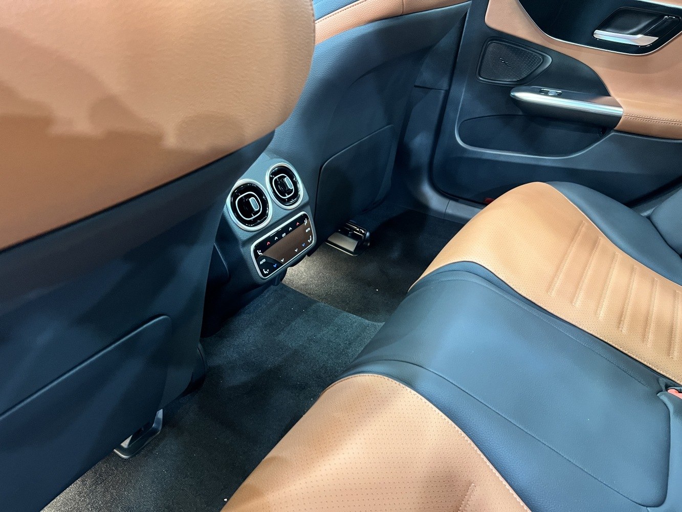 Rear climate control vents and two-tone leather rear seats