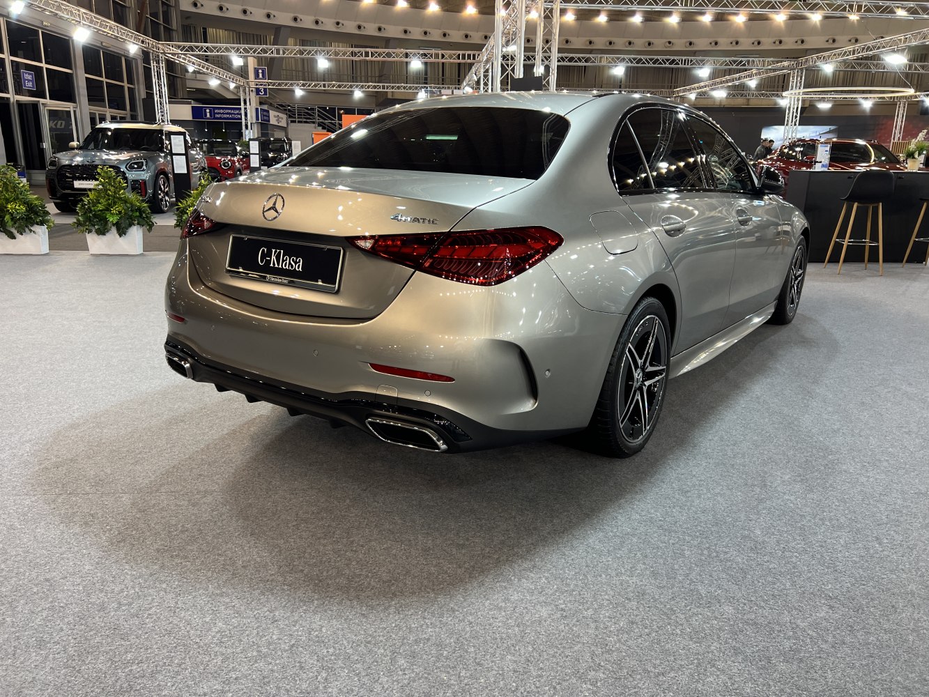 Rear view of sedan with 4MATIC badge and distinctive tail lights