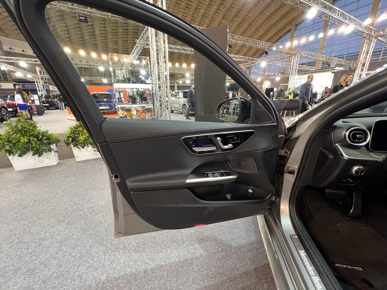 Interior door panel with control buttons and premium trim