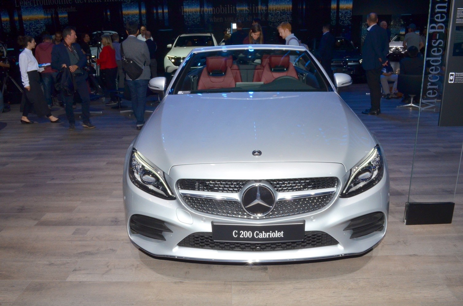 Front view of a convertible with luxury seats and detailed grille