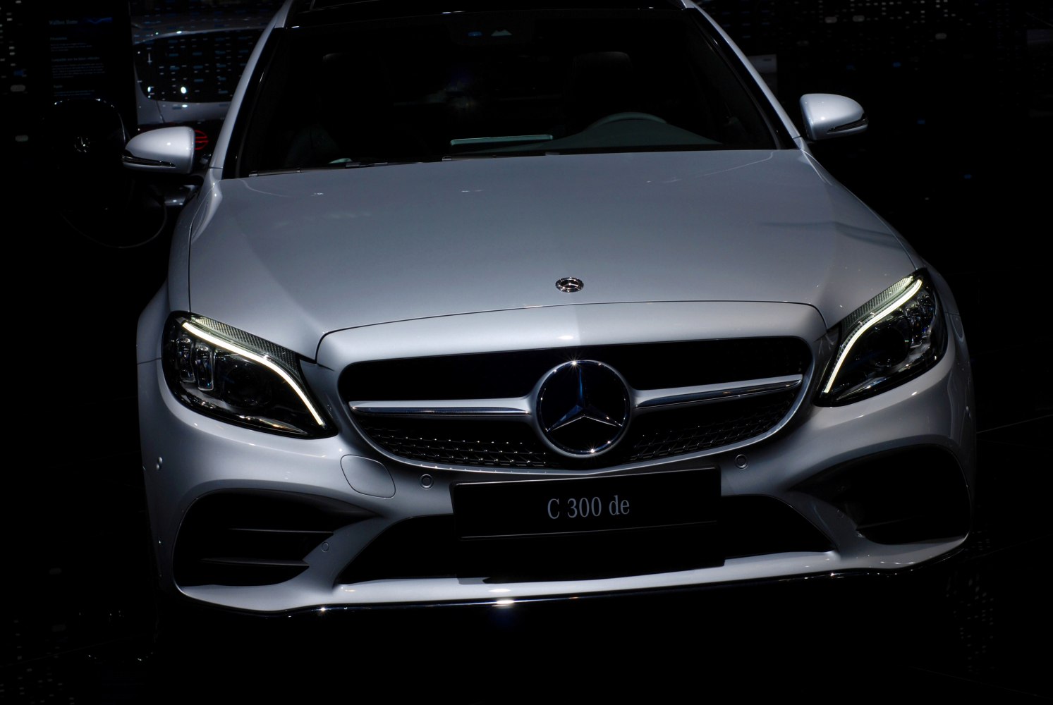 Front view with LED headlights and distinctive grille