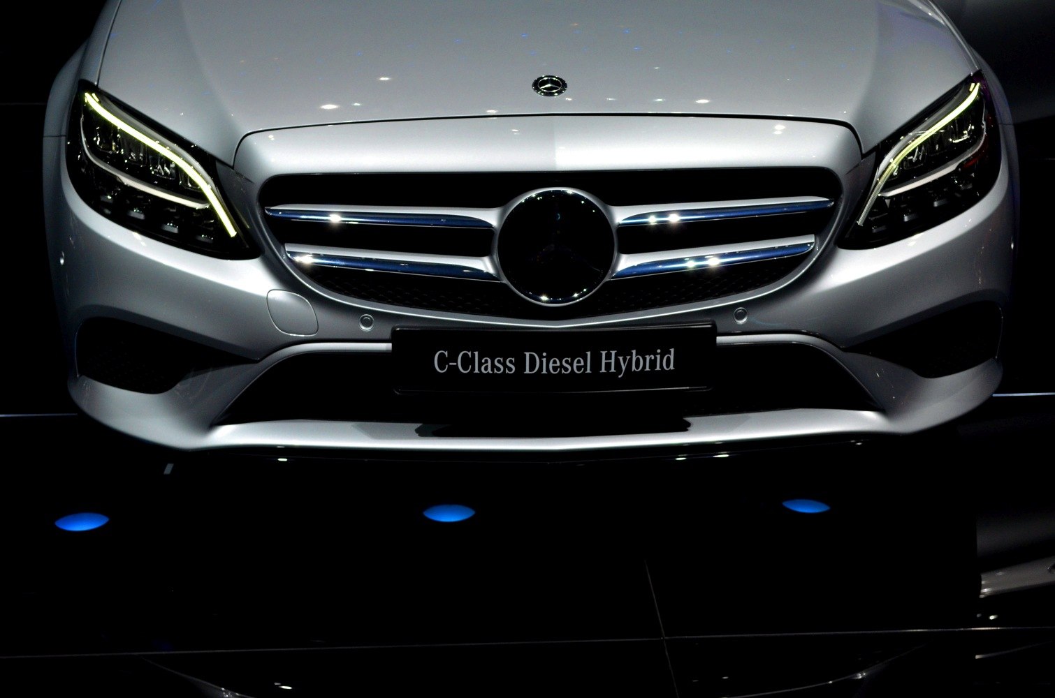 Front grille and LED headlights of a modern luxury sedan