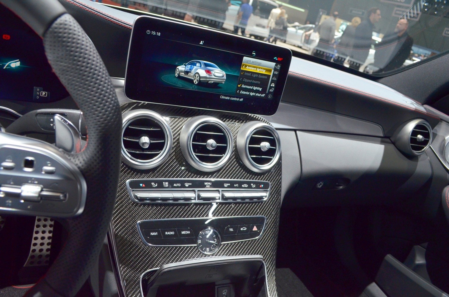 Dashboard with carbon fiber trim and digital infotainment display