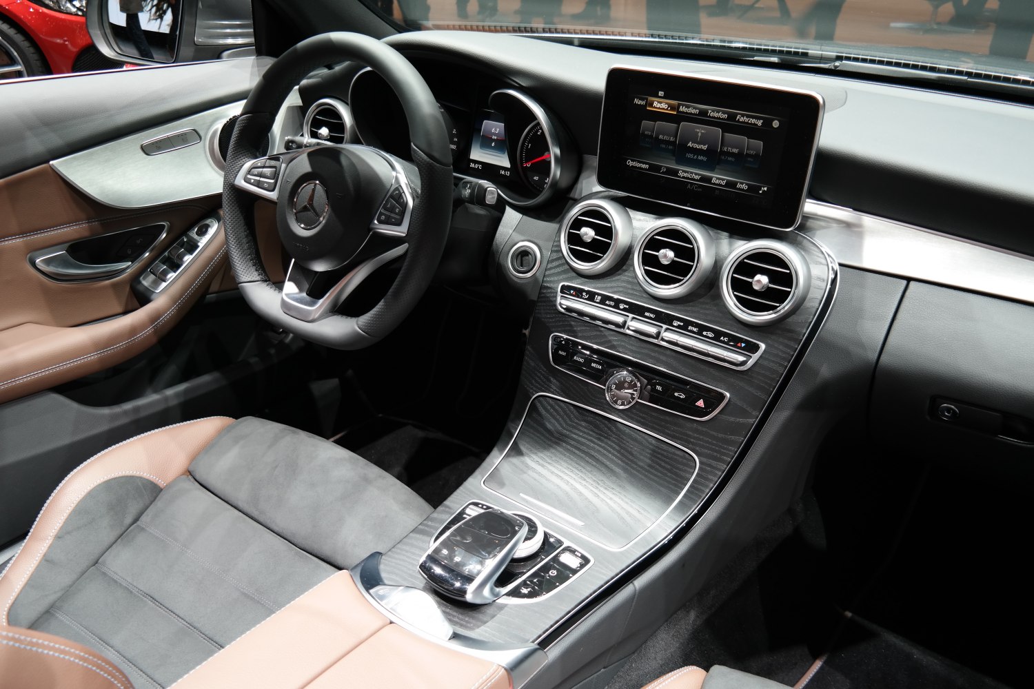 Luxury car interior with digital display and multifunction steering wheel
