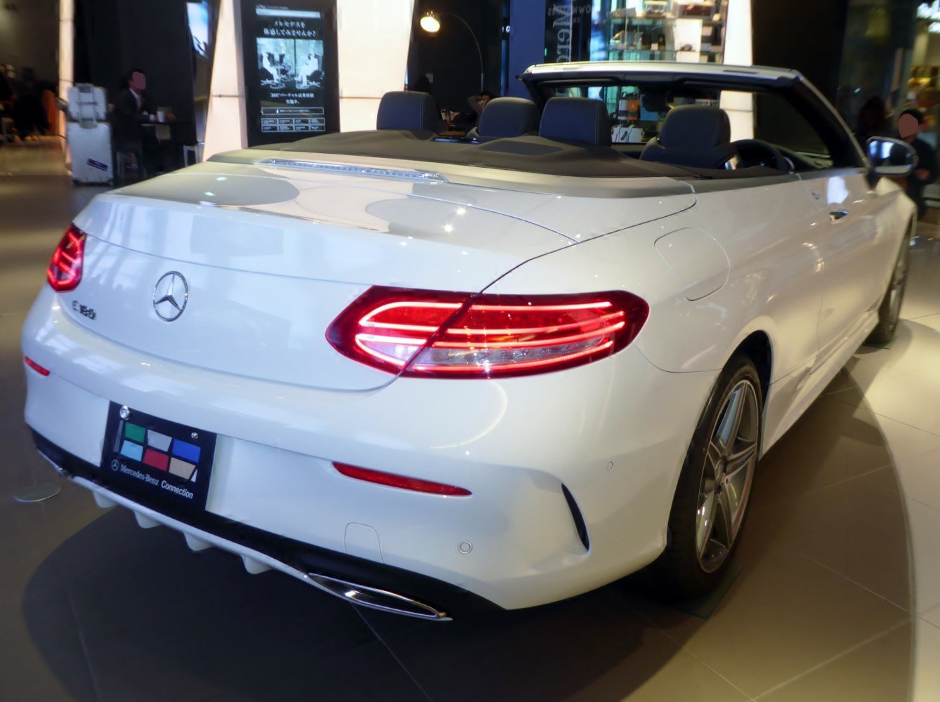 Convertible rear view with LED tail lights and soft top down