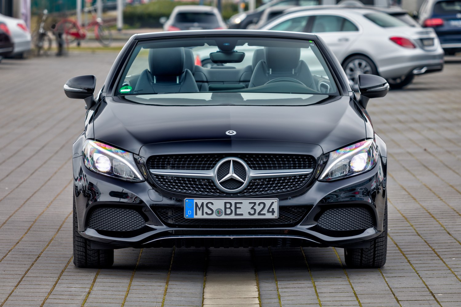 Front view of convertible with LED headlights and aggressive grille